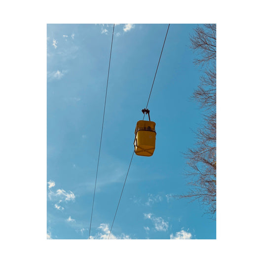 Cable Car Sky Poster — Yellow Gondola Against Blue Sky (Satin Poster)